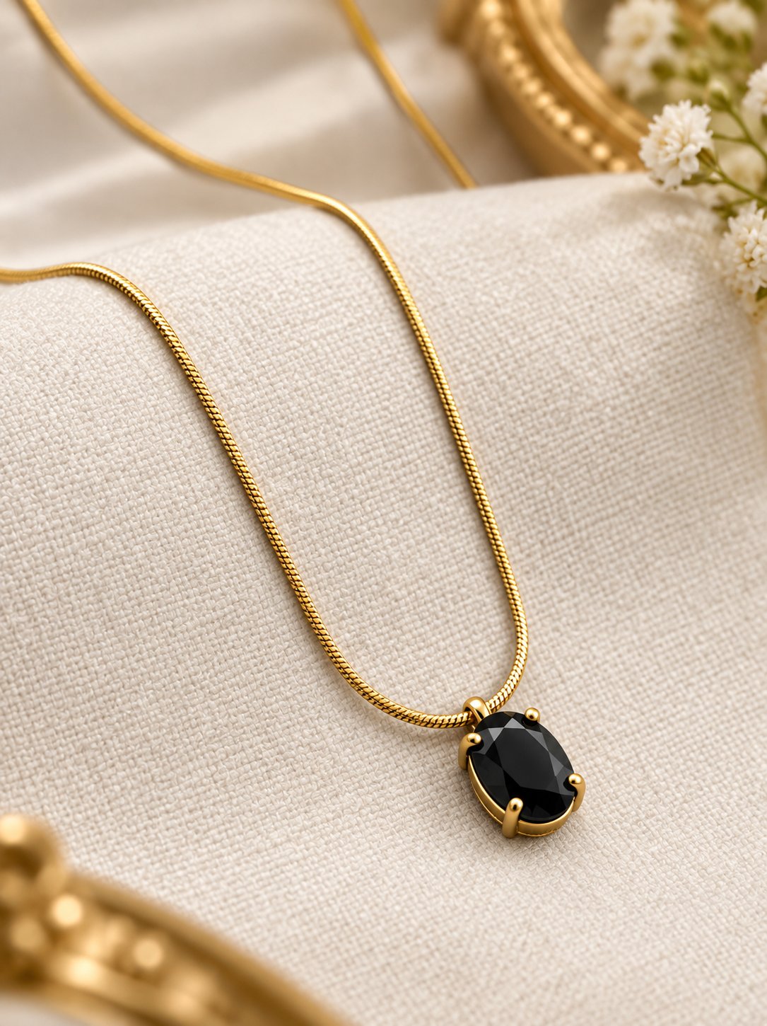Gold Oval Black Stone Pendant
